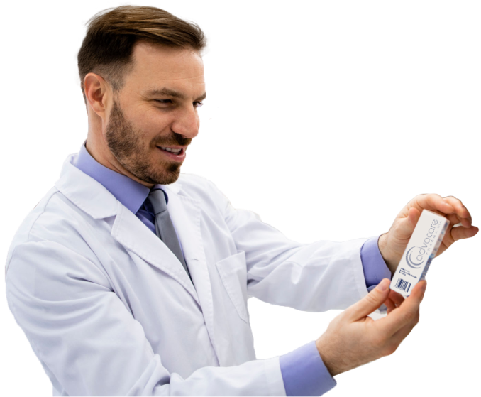 Pharmacist holding a package of a pharmaceutical product.
